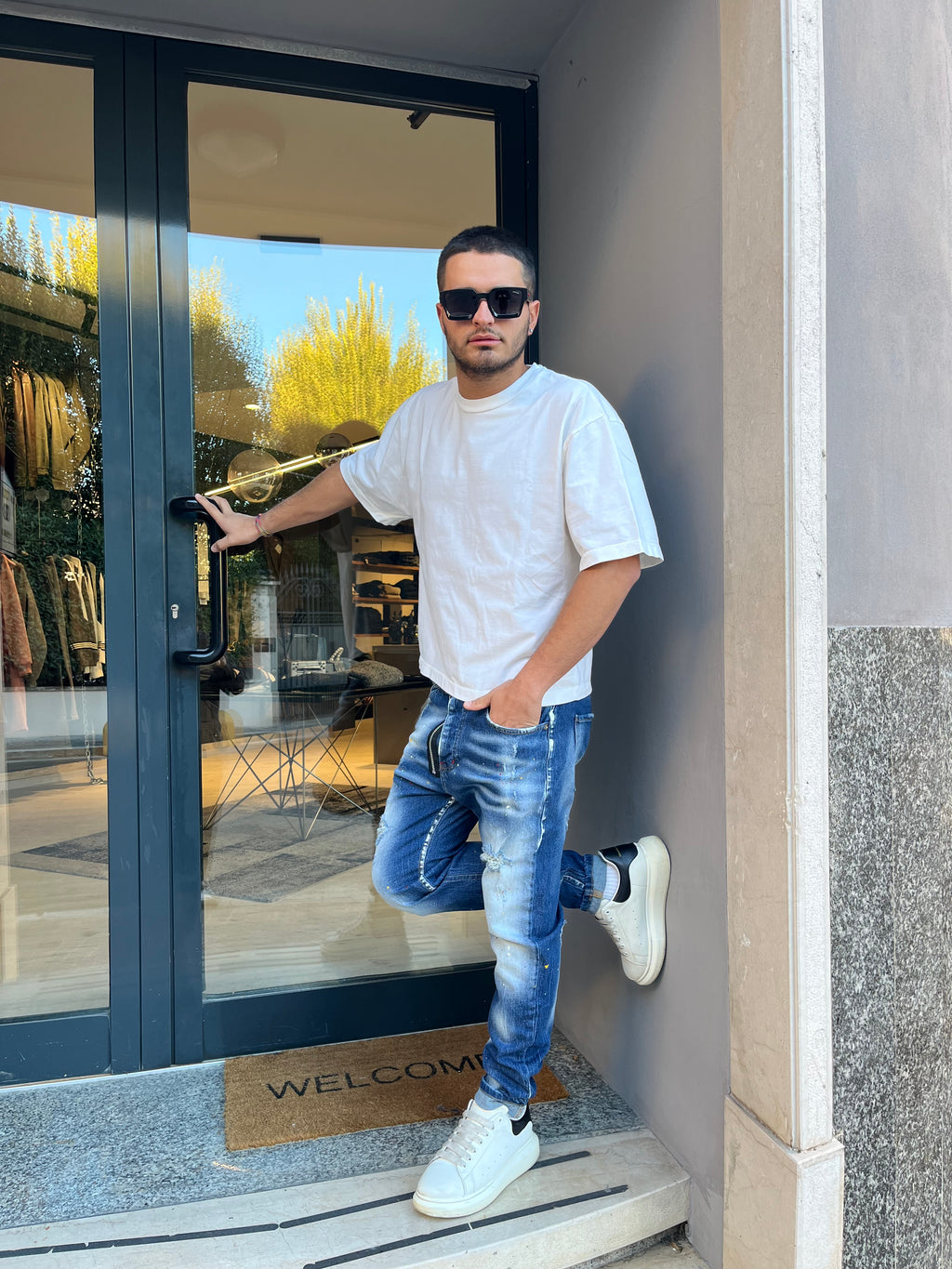 Jeans Slim Fit Destroyed “Urban Paint” – Effetto Schizzato e Lavaggio Sfumato