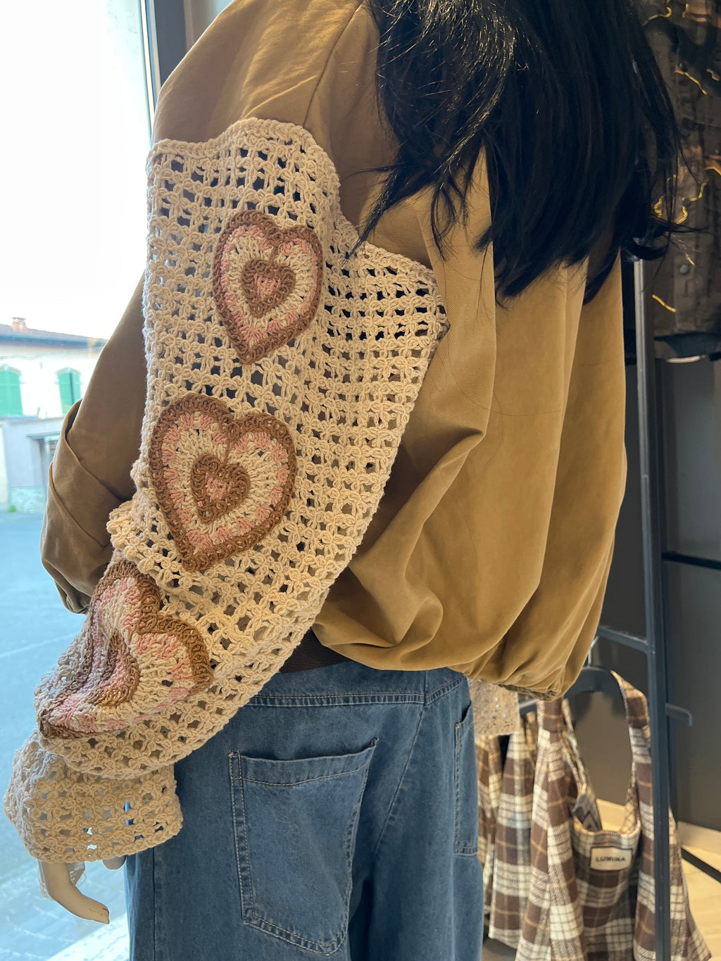 Bomber con manica in macrame